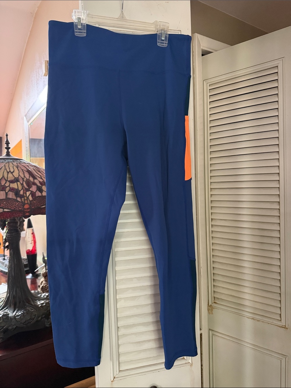 Zyia Women's High-Waist Performance Leggings in Navy with Orange Pocket